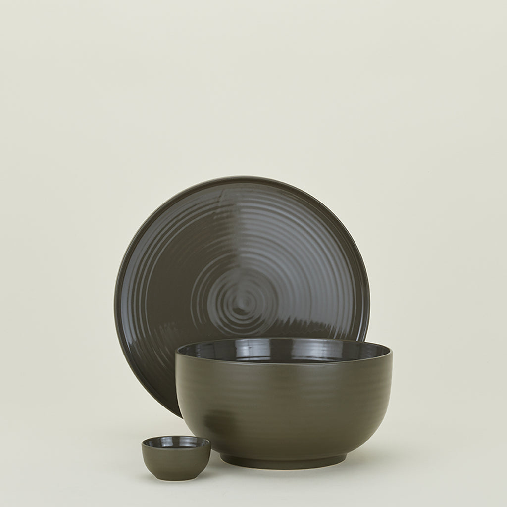 Set of three hand-crafted ceramic kitchenware items in olive green.