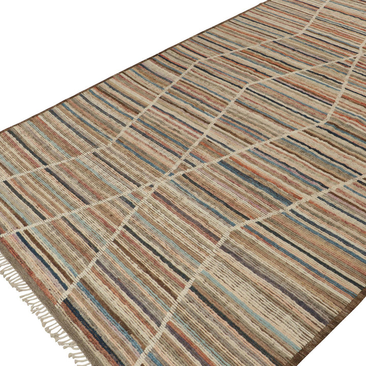 Intricate handwoven rug in earth tones with geometric symmetrical pattern.
