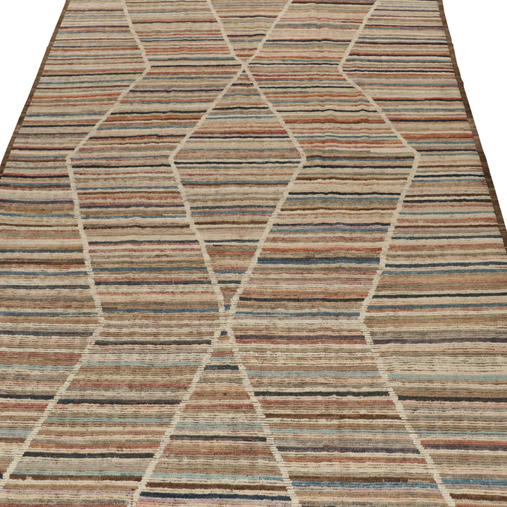 Geometric diamond patterned rug in earthy tones, traditional tribal design.