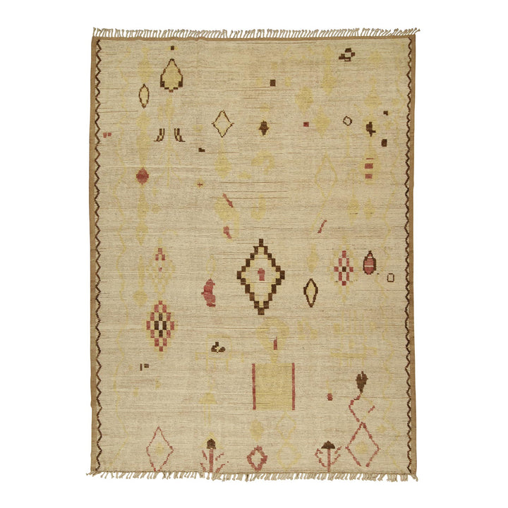 Geometric patterned handwoven rug in neutral tones with tribal motifs.