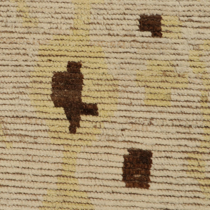 Close-up of a woven textile with looped yarn pattern.