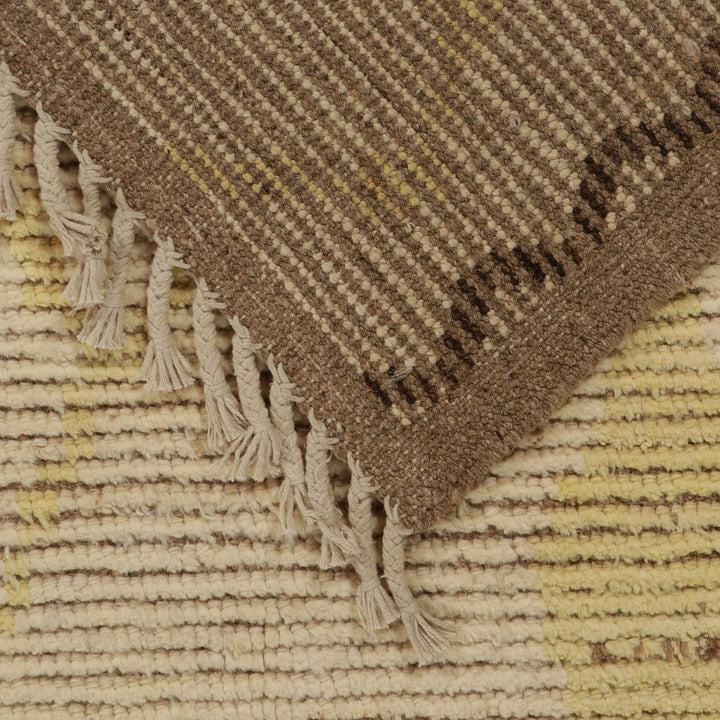 Close-up of contrasting textiles with stripes and raised lines.