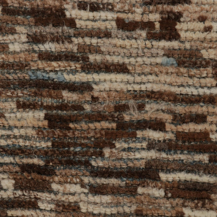 Textured fabric with horizontal stripes in earthy tones, fluffy and warm.