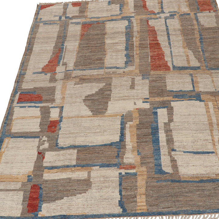 Modern abstract area rug with geometric shapes in neutrals and pops of color.
