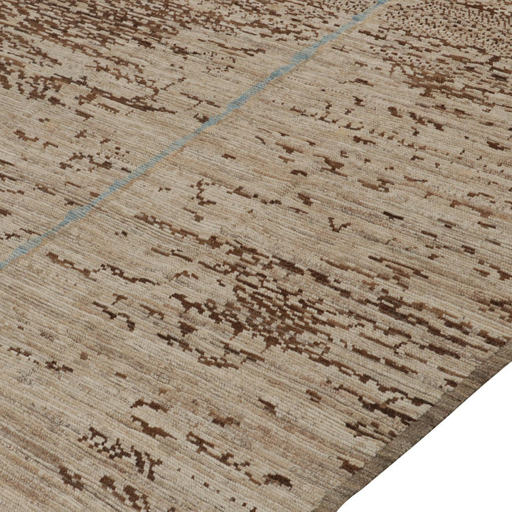 Close-up view of beige carpet with abstract brown pattern design.