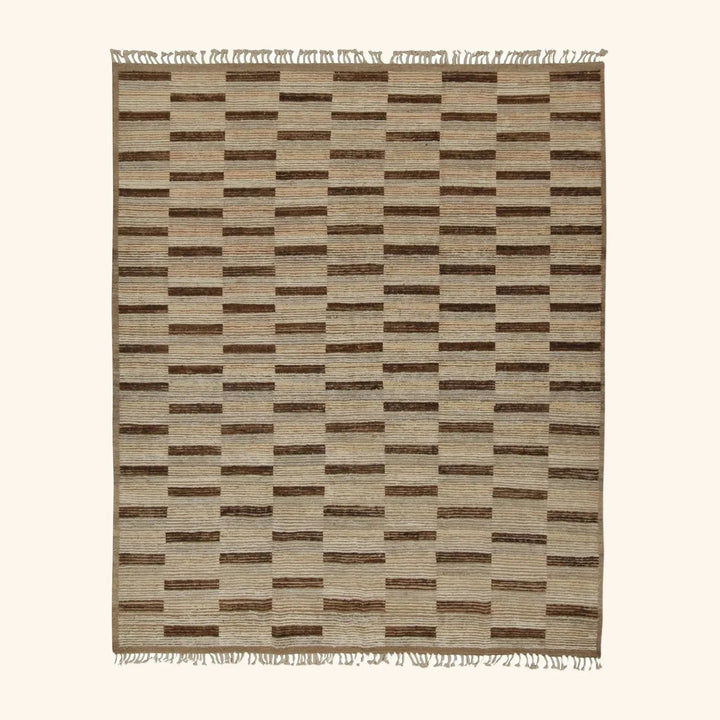 Modern rectangular area rug with geometric pattern in beige and brown.