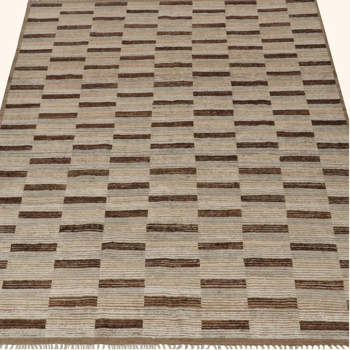Textured rug with horizontal stripes in varying shades of brown.