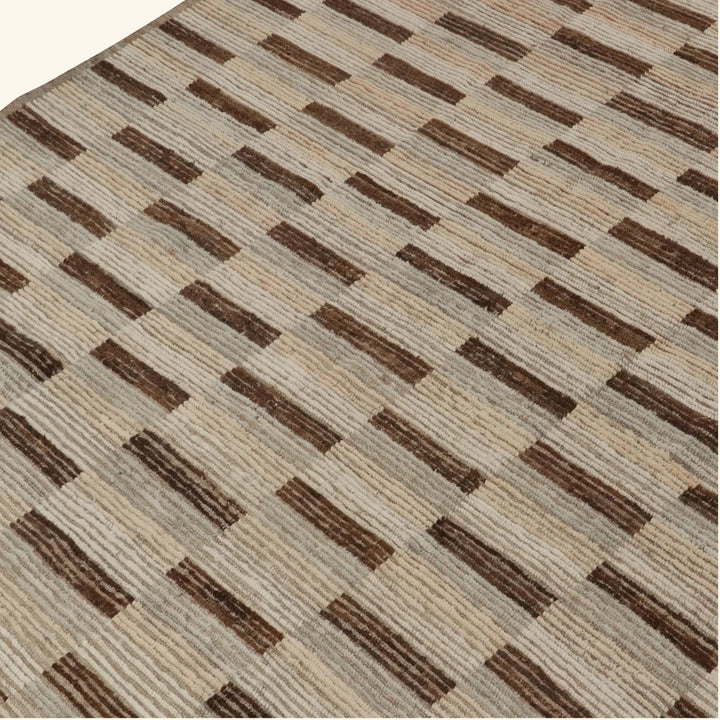 Close-up of striped brown and beige textured fabric material.