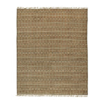Natural jute area rug with fringe detail on neutral background.