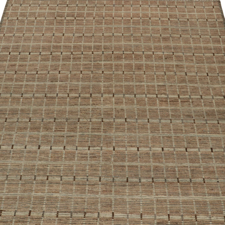 Close-up of woven textile with grid pattern in beige tones.