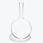 Empty round-bottom flask used in laboratories, with slight imperfections visible.