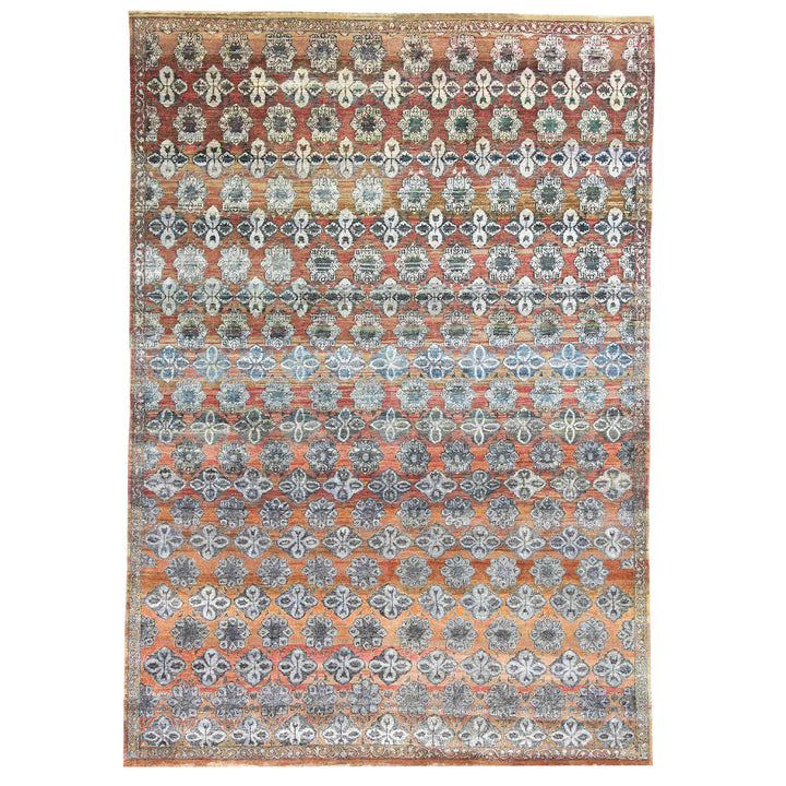 Intricate geometric patterned area rug with rich colors and detail.