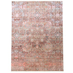 Intricate vintage rug with geometric and floral designs in muted tones.
