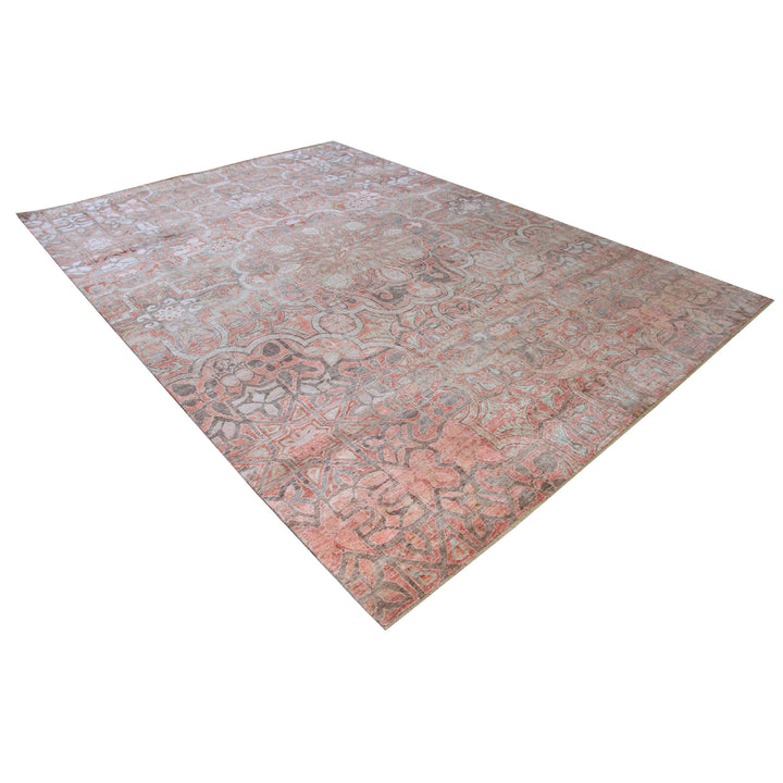 Rectangular rug with ornate floral design in vintage shades.