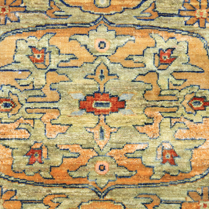 Intricate Persian rug with symmetrical floral and geometric patterns