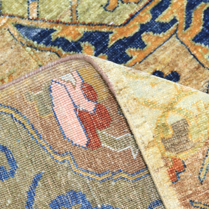 Intricately designed rug folded to reveal detailed underside textures.