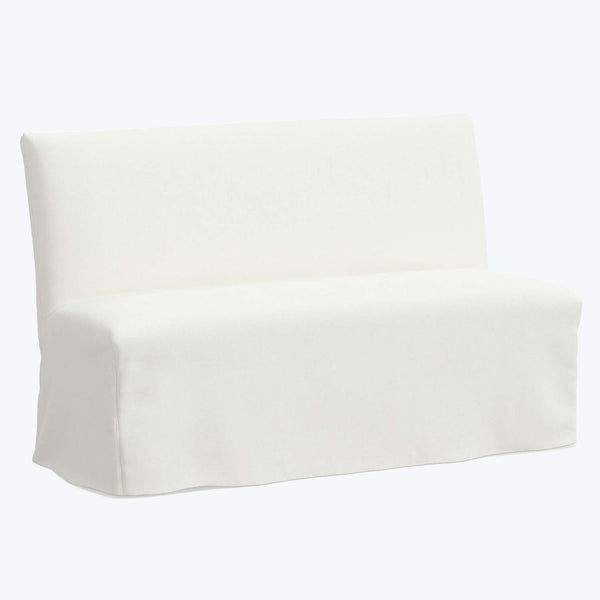 Plain white sofa slipcover for protection or new look upgrade.