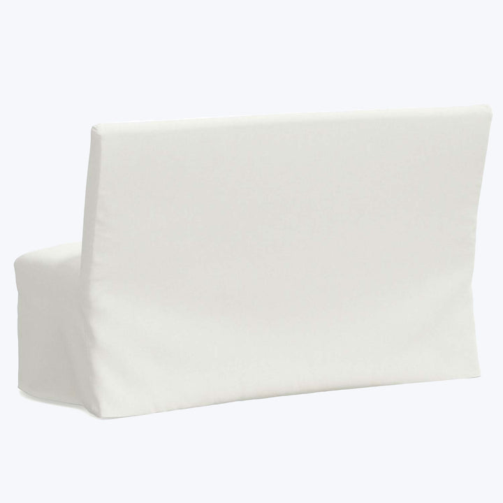 Plain white husband pillow with armrest for back support sitting.