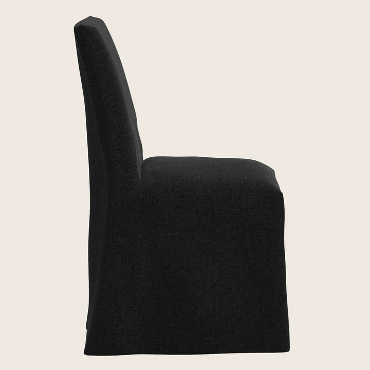 Sleek modern dining chair in dark fabric with tall backrest