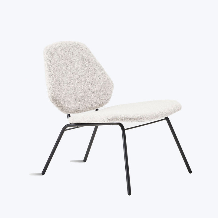 Modern minimalist chair with light fabric upholstery and black metal legs.