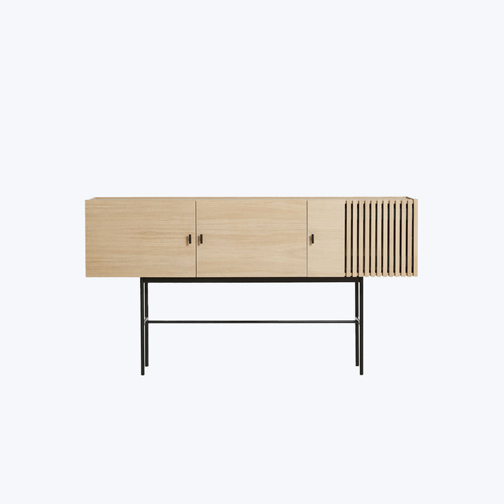 Modern minimalist sideboard with light wood and black metal frame.