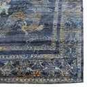 Vintage distressed rug with intricate patterns in dark blue tones