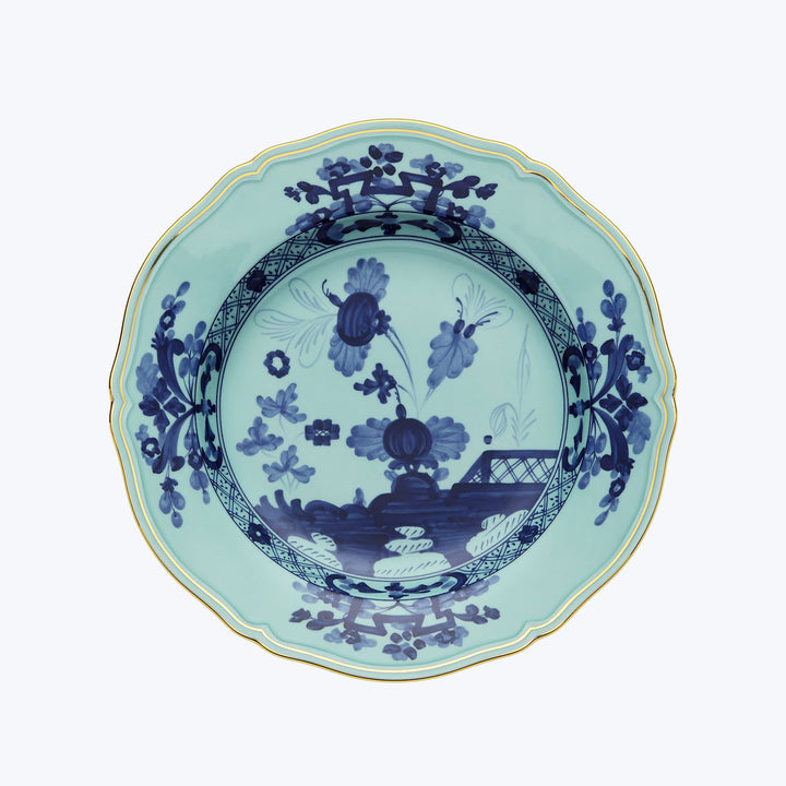 Traditional Chinese porcelain plate with intricate blue floral designs.