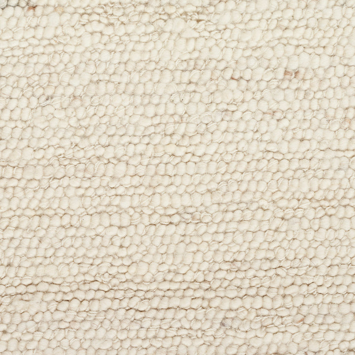 Close-up photograph of textured surface resembling luxurious leather material.
