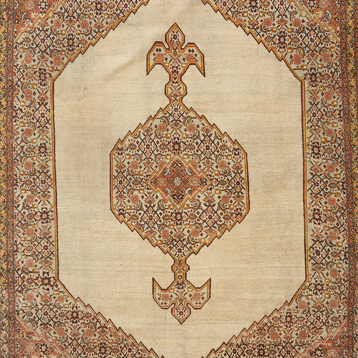An ornate Persian rug with intricate patterns and vibrant colors.
