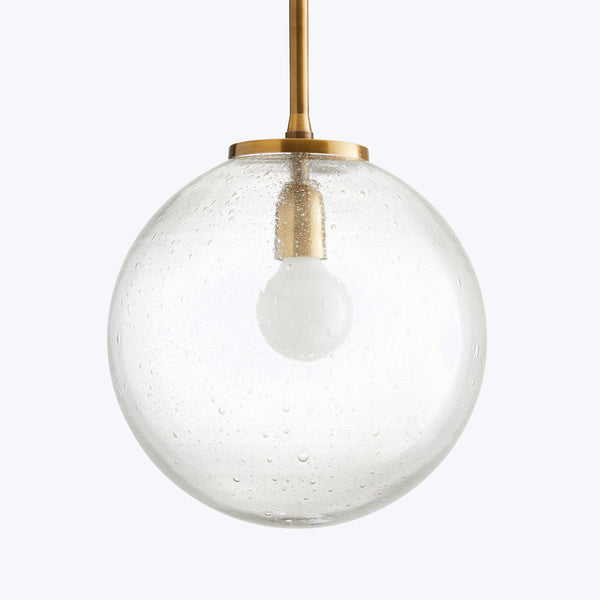 Modern spherical glass pendant light with water droplet texture design.