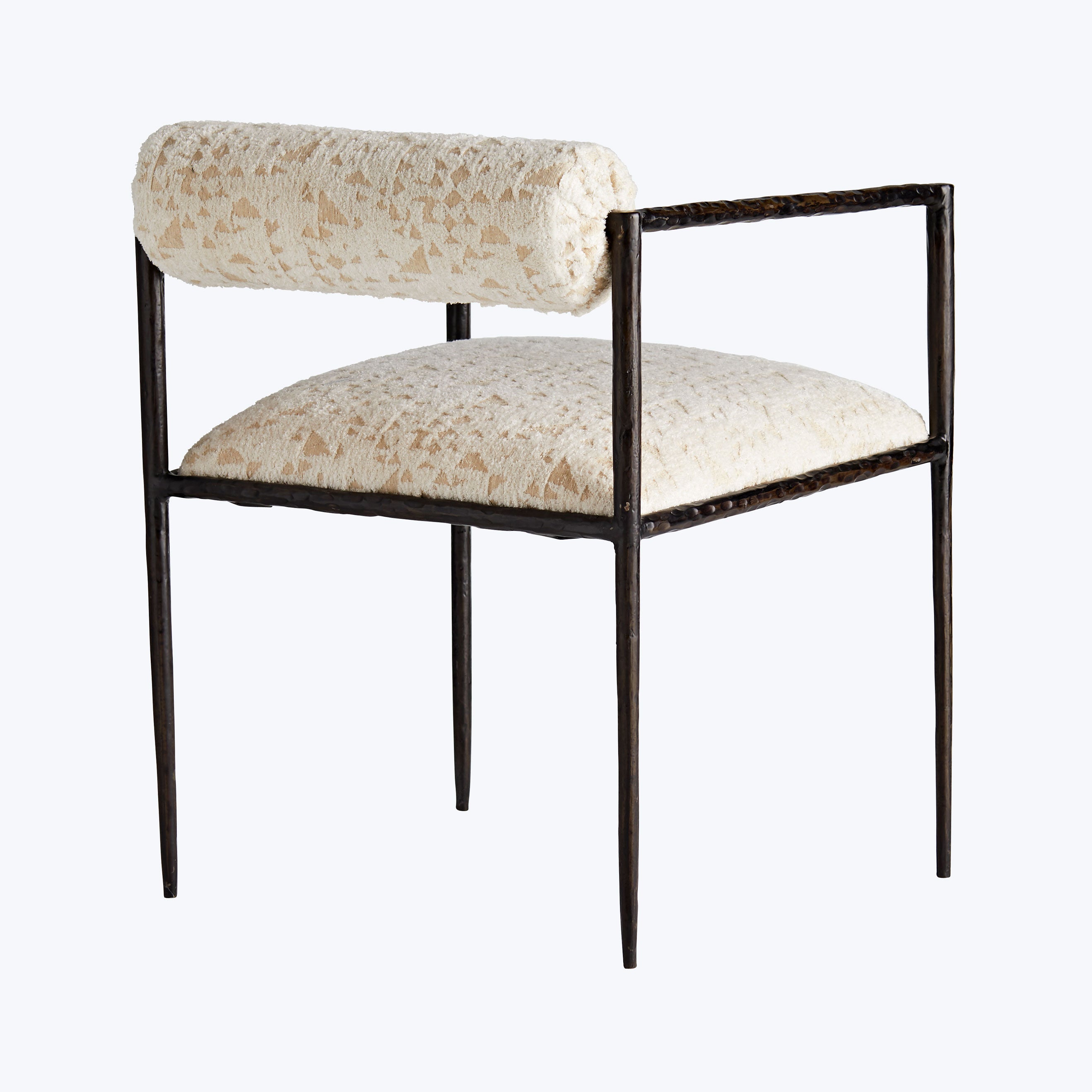 Modern chair with metal frame, sleek upholstery, and geometric pattern.