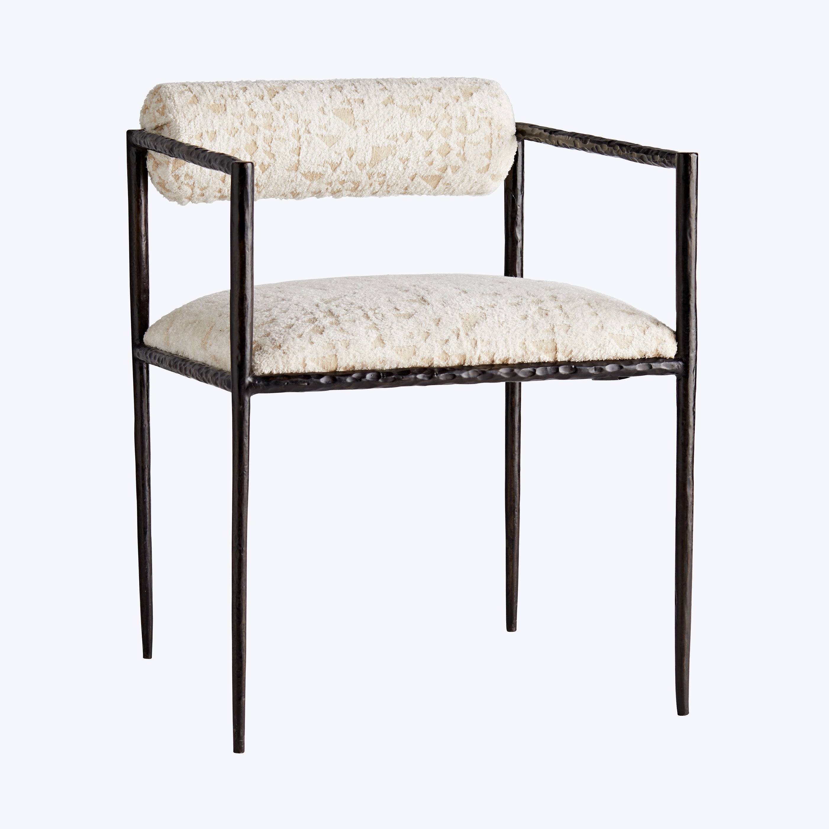 Modern chair with industrial metal frame and plush upholstered seat