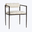 Modern chair with industrial metal frame and plush upholstered seat