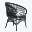 Contemporary black armchair with open weave pattern and patterned upholstery.