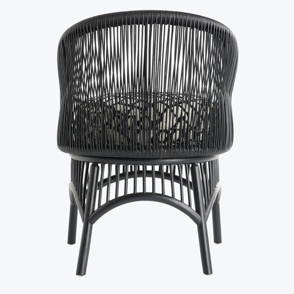 Sleek modern chair with curved, barrel-back design and black rods.