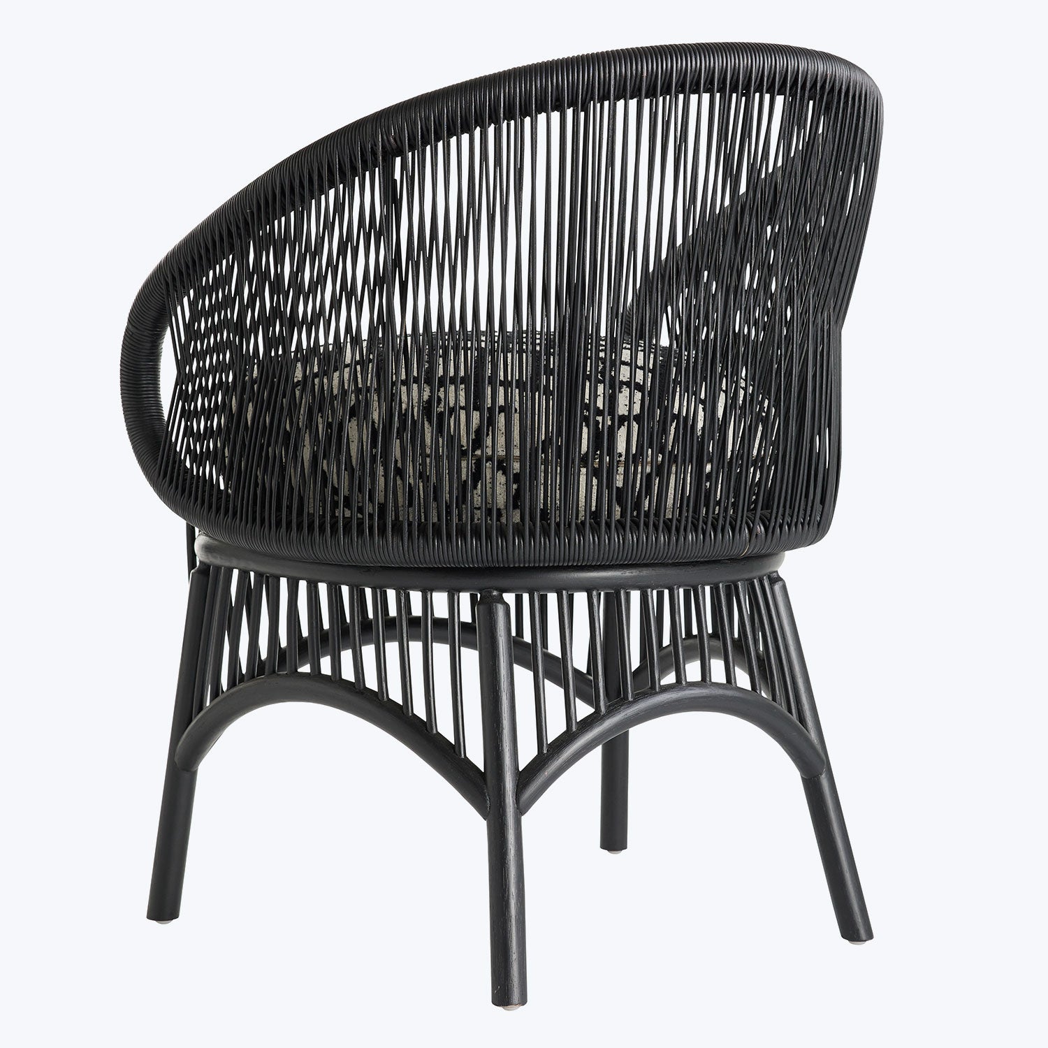 Modern black wicker chair with sleek design and airy weave