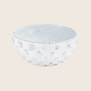 White textured bowl with bubble pattern and rustic edge design.