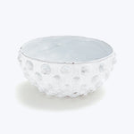 White textured bowl with bubble pattern and rustic edge design.