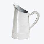 Classic metal pitcher with elegant design for serving beverages.
