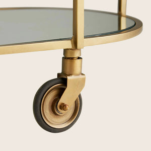 Stylish gold bar cart with three shelves and sleek design. - hover