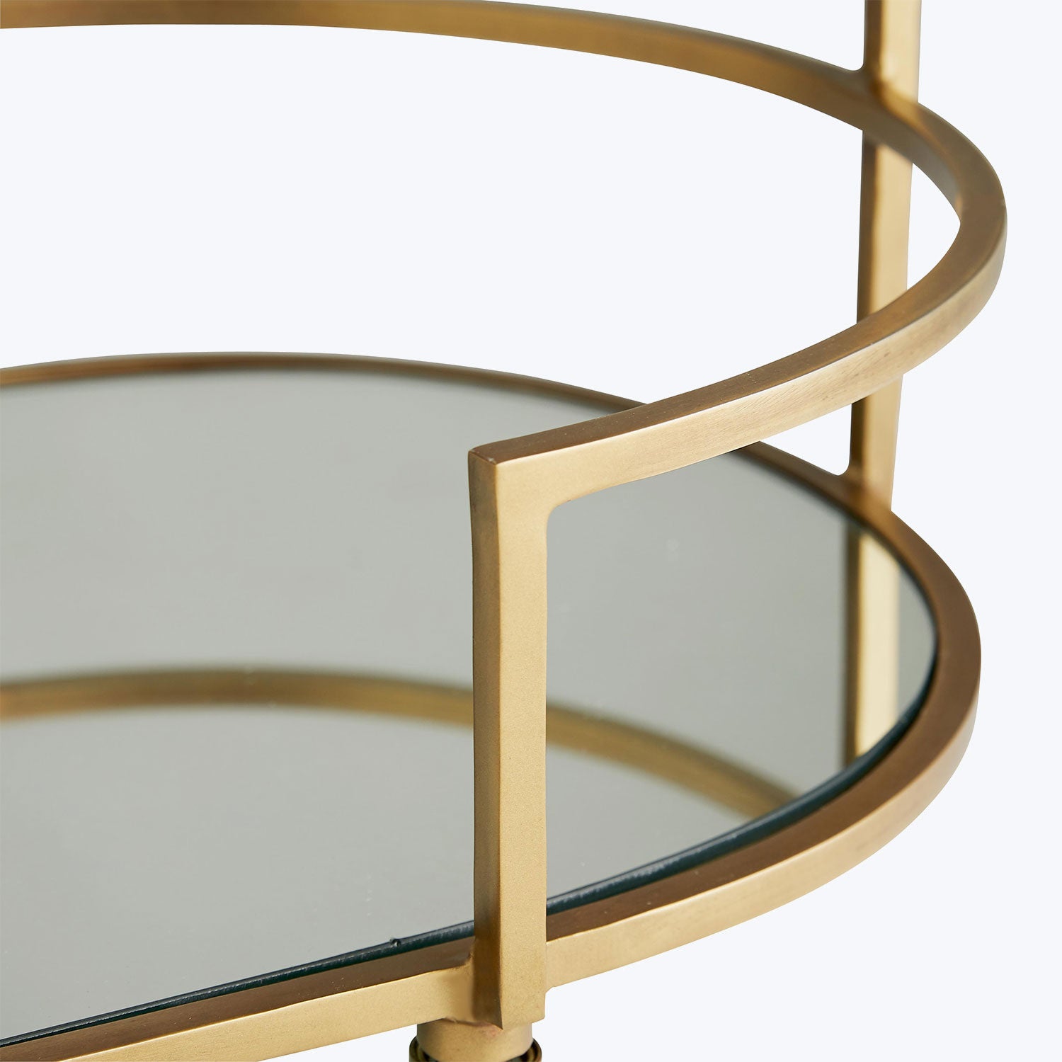 A modern, minimalist side table with a sleek metal frame.