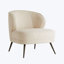 Contemporary armchair with curved backrest and elegant beige upholstery