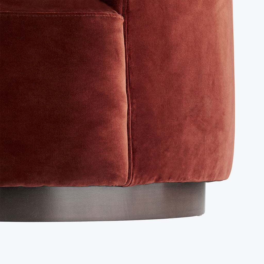 Modern and elegant furniture featuring plush, red-brown velvet upholstery.
