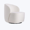Modern armchair with off-white upholstery, curved backrest, and concealed base.