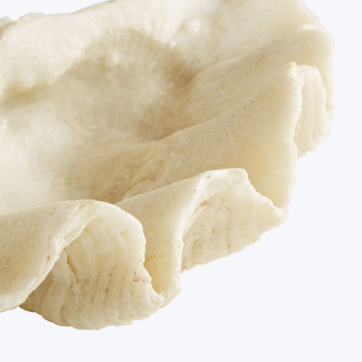 Close-up of whipped cream with a light and fluffy texture.