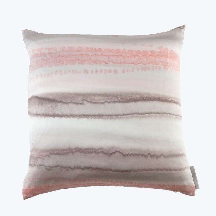 Decorative rectangular pillow with abstract pink and grey watercolor stripes.
