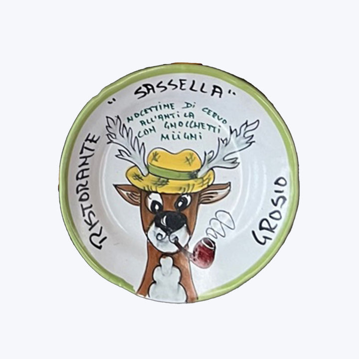 Whimsical deer character plate from Italian restaurant Sassella, charming design.