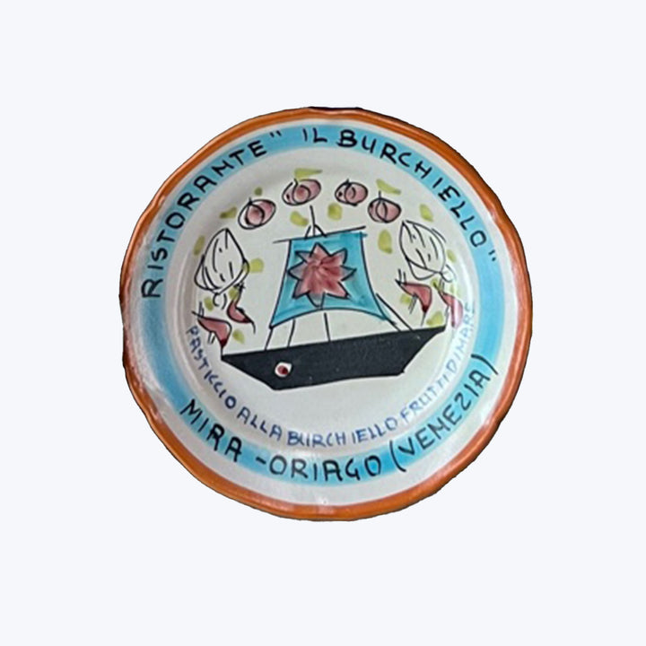 Colorful ceramic plate from Ristorante 'Il Burchiello' in Venice, Italy.