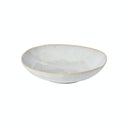 Elegant ceramic bowl with golden rim adds sophistication to table.
