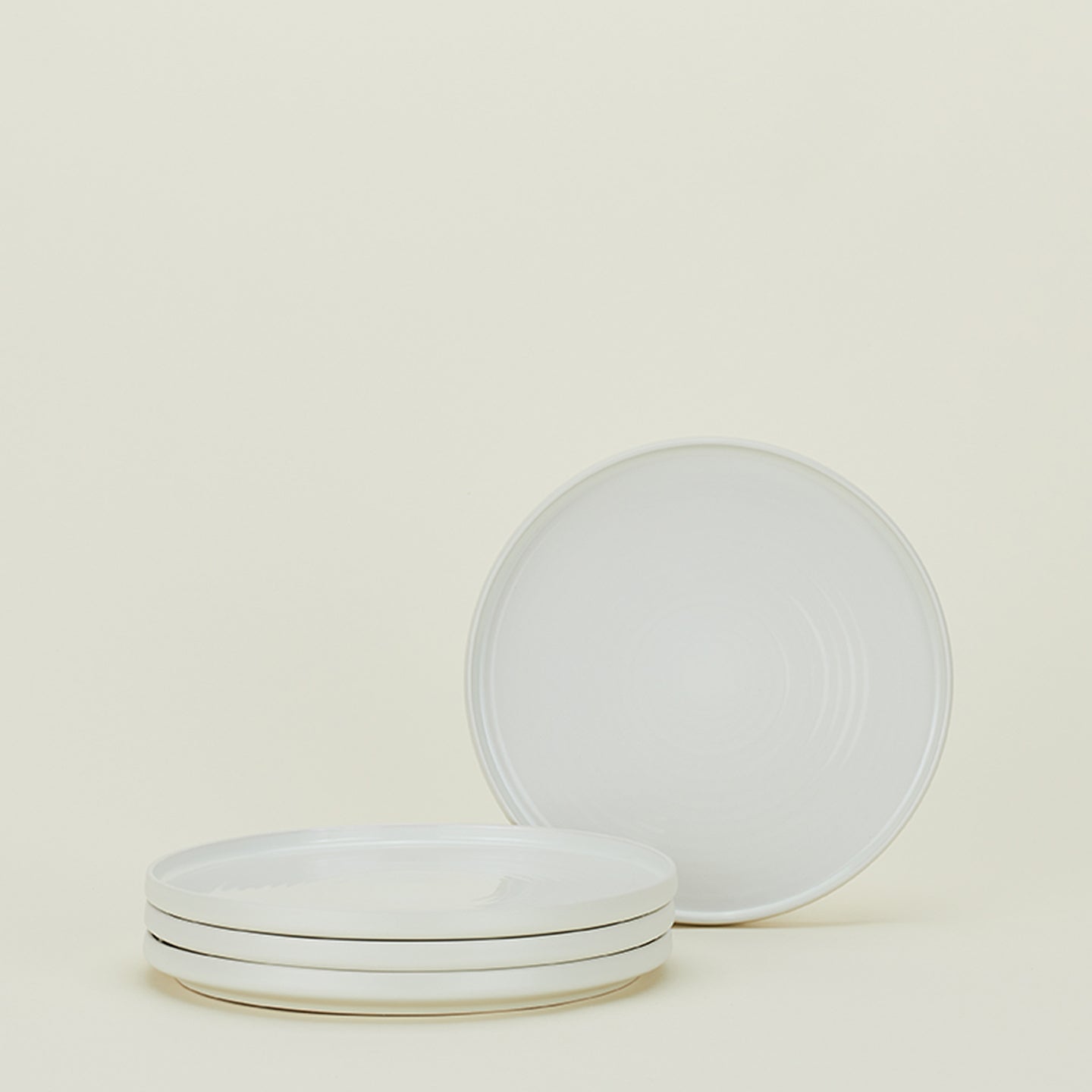 Minimalist white plates showcase simplicity and clean aesthetics.
